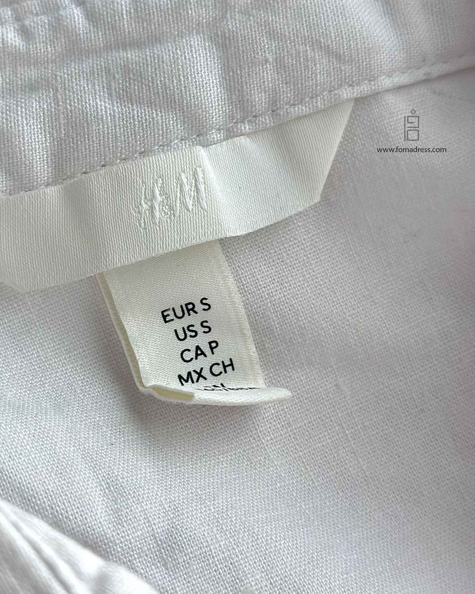  جزئیات پارچه شومیز سفید بیسیک H&M 